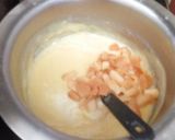 A picture of step 9 of Colourful rasgulla in custard.
