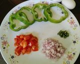 A picture of step 1 of Egg Capsicum Rings.