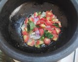 A picture of step 2 of Vegetable Dalia (broken wheat dalia).