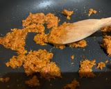 A picture of step 4 of Beef and grilled aubergine red curry topped with Bird eye chillis.
