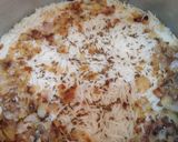 A picture of step 7 of Karahi qeema matar with brown onion rice.
