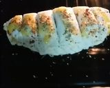 A picture of step 9 of Dominoes style garlic bread.