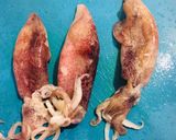 Foto del passaggio 2 della ricetta Calamari e carciofi saltati in padella