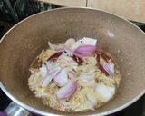A picture of step 3 of Red amaranth rice.