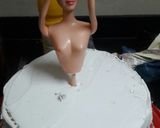 A picture of step 5 of Doll cake.