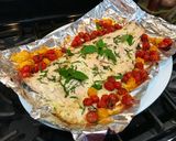 A picture of step 8 of Super Easy Roasted Lemon Dill Salmon with Basil Tomatoes.