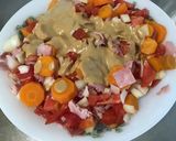 Une image de l'étape 12 de Salade marinée de carottes aux tomates et jambon sauce cumin.