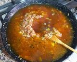 Foto del paso 19 de la receta Arroz bomba caldoso de pulpitos y tiras de piquillo