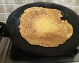 A picture of step 7 of Besan cheela with tamater chutney.