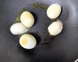 A picture of step 1 of Dim Bhapa (Steamed Egg Curry) Bengali lunch.
