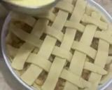 A picture of step 10 of Apple pie with flaky butter crust served with vanilla ice cream.