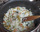 Foto del paso 4 de la receta: Pollo estofado con boniato, pasas sultanas, cúrcuma y jengibre