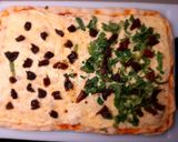 Foto del paso 7 de la receta: Pizza muzzarella con rúcula y tomates secos