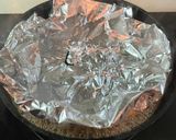 A picture of step 3 of Japanese style boiled plaice.