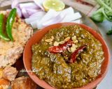 A picture of step 1 of Sarson ka saag Makki di roti.