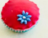 A picture of step 7 of Eggless cupcakesDecorated with buttercream, fondant and marshmallows.
