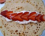 A picture of step 5 of Crepes with Strawberries and Whipped Cream 🍓.