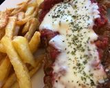 Foto del paso 3 de la receta: Milanesas de ternera a la napolitana con papas fritas