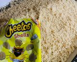A picture of step 5 of Cheetos Cigars.