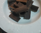 Foto del paso 7 de la receta: Bizcocho de naranja bañado en chocolate con almendras laminadas