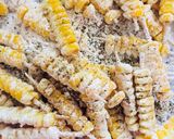 A picture of step 3 of Masala corn fries.