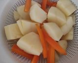 Foto del paso 5 de la receta: Cinta de Lomo con Naranja, Salsa de Humo y Hoisin al Papillote con sus Patatas y Zanahorias