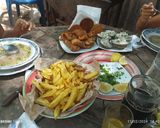 Foto del paso 4 de la receta: Rollizo frito con papas fritas