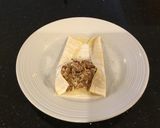 A picture of step 5 of Tuscan Beef Shortrib Egg rolls.
