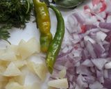 A picture of step 1 of Kaanda Batata Poha (onion/potato poha).