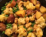 A picture of step 6 of Chicken Aloo Gobi.