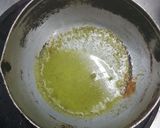 A picture of step 5 of Green Curry Squid in Young Coconut.