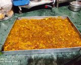 A picture of step 6 of Raw Turmeric burfi.
