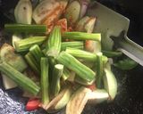 A picture of step 1 of Brinjal and drumstick curry.