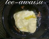 A picture of step 5 of Gurasar larabawa with potatoes and cabbage sauce.