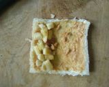 A picture of step 6 of Peanut Butter French Toast Roll-Ups With Banana & Almond Filling.