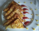 A picture of step 3 of Onion cheesy corn toast.