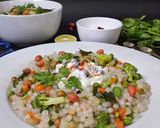 A picture of step 8 of Sabudana Vegetable Khichdi With Cucumber Pomegranate Raita.