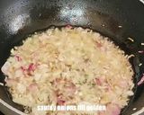 A picture of step 2 of Gobhi matar masala.