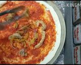 A picture of step 7 of Chicken fajitas pizza.
