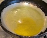 A picture of step 2 of Shorshe Ilish (Hilsa Fish cooked in mustard gravy).