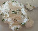 A picture of step 1 of Pomordorini e caprino cherry tomatoes stuffed with goat's cheese.
