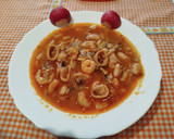 Foto del paso 19 de la receta: Alubias con calamar, gambas y almejas