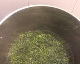 A picture of step 2 of Hindbeh with Oil and Onions.