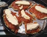 Foto del paso 3 de la receta: Milanesas de pollo napolitana con ensalada