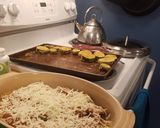 A picture of step 7 of Zuccinni Parmesean.