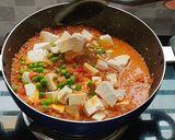 A picture of step 9 of Muttor paneer with laccha paratha.