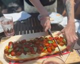 Foto del paso 5 de la receta: Pan pizza con tomates cherry asados, mozzarella y albahaca