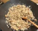 A picture of step 2 of Creamy mushroom risotto.