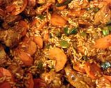 A picture of step 8 of Arroz Amarillo con Carnitas/ Achiote Rice Supper with Pork Carnitas.