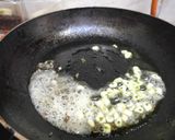 A picture of step 1 of Garlic fried rice.